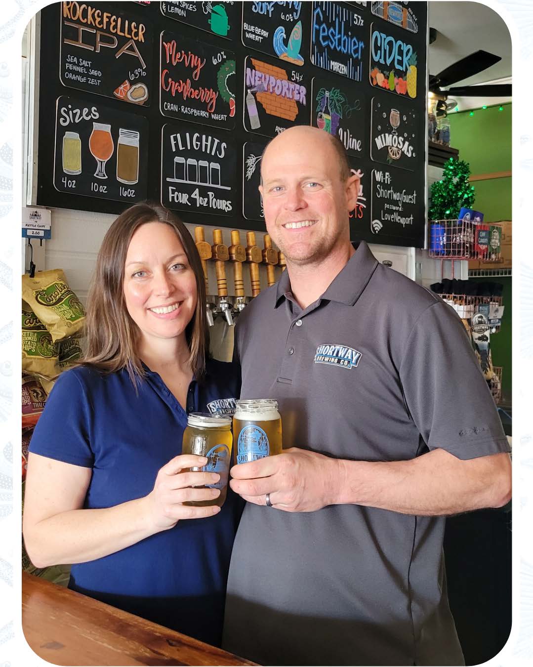 two people holding a drink inside a bar